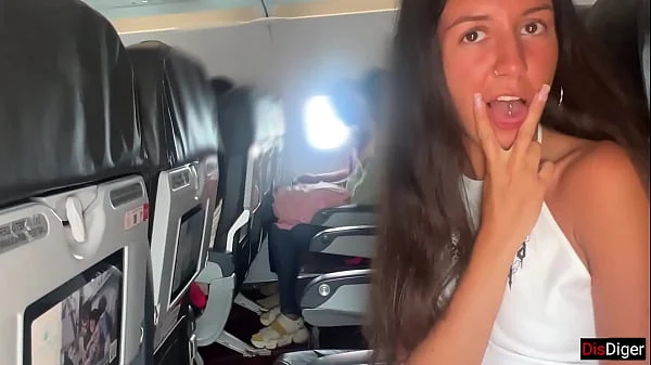 Risky public blowjob on a plane - we got caught!