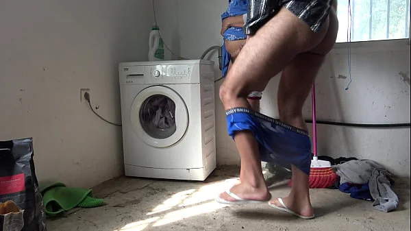 A Muslim maid is fucked doggystyle while doing the laundry