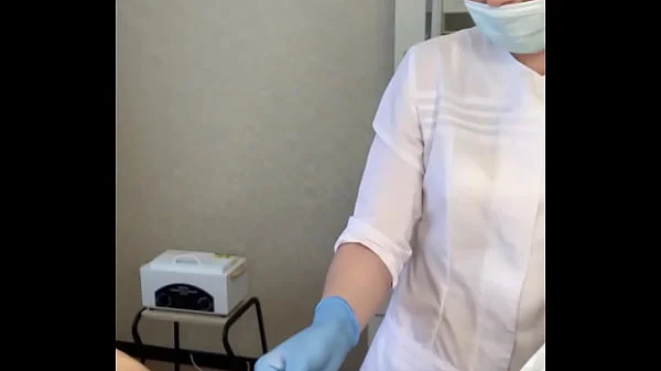 The patient CUM powerfully during the examination procedure in the doctor's hands