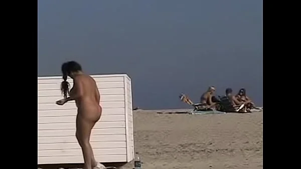 Exhibitionist Wife 19 - Anjelica teasing random voyeurs at a public beach by flashing her shaved cunt!