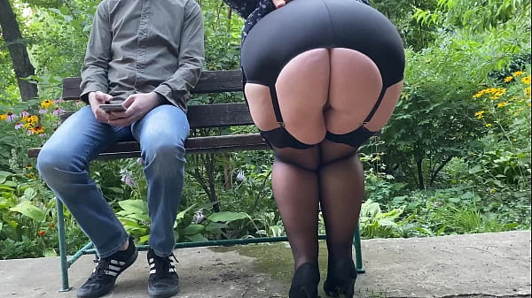 Gorgeous ass pissing in a public park rear view