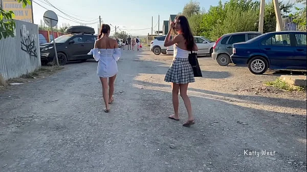 Two girls walk in public without panties and show pussies